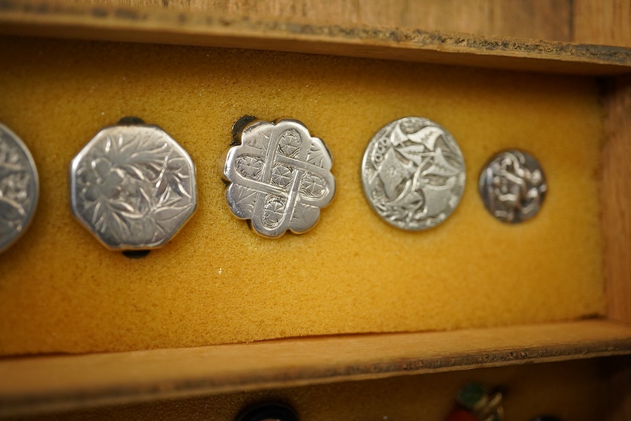 Sixteen assorted late 19th/early 20th century buttons and studs, largest 23mm;, Condition- good